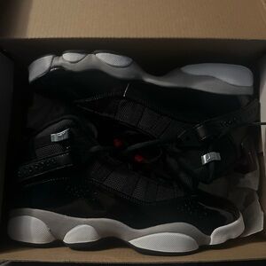 Jordan Kids Black and White High-Top Sneakers